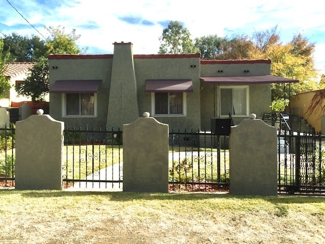 Front view of house before it was paintd white - 1968 El Molino Ave