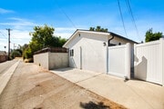 Private access to apartment through the alley and a dedicated parking spot. - 23046 Saticoy St House Unit 23044