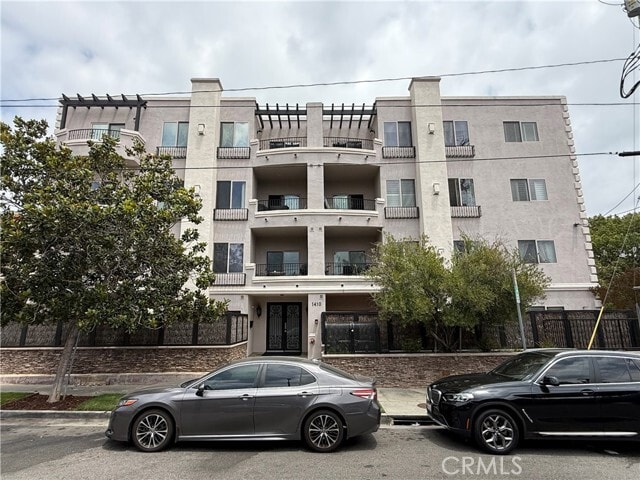 Building Photo - 1410 N Curson Ave Unit 105