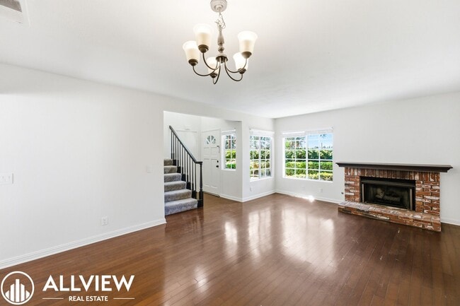 Photo - Fully Renovated 2 Bed Townhome with Private Patio, 2-Car Garage & Community Pool