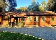front of house shaded by pines - 7627 Pine Blvd House