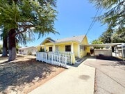 Photo - Charming 3 Bedroom Home with Included Landscaping, Spacious Backyard & Carport