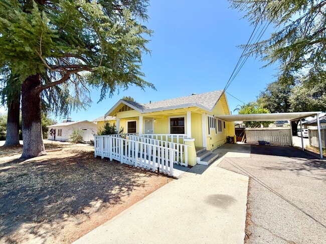 Photo - Charming 3 Bedroom Home with Included Landscaping, Spacious Backyard & Carport