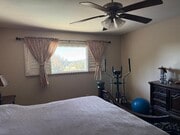Master Bedroom indoor exercise bike - 7010 Dennison St