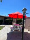 BBQ & Picnic Area - 4607 Plaza Ln Apartments Unit #E