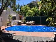 Partial view of yard & pool - 8567 Walnut Dr Unit Guesthouse
