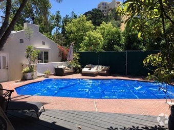 Partial view of yard & pool - 8567 Walnut Dr Unit Guesthouse