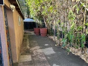Path to yard and gazebo - 10809 Huston St