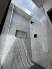Shower with a skylight - 7834 S Harvard Blvd Unit 7836 S Harvard