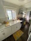 Kitchen, on left through doorway when walking through front door - 1644 Mohawk St House