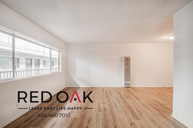 Building Photo - 916 S Carondelet St Unit 6