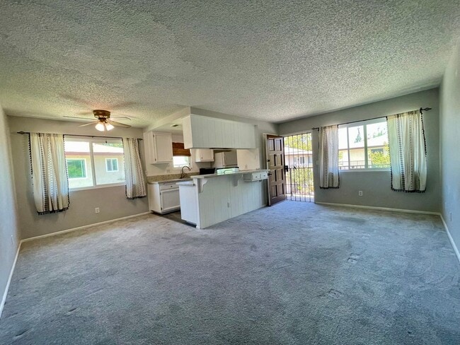 Photo - 2 bedrooms, 1 bath with carport Home is Close to the 52, 67 and 125 freeways, shopping and restau...
