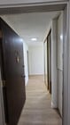 entrance with hall closet and cabinet - Marina Tower