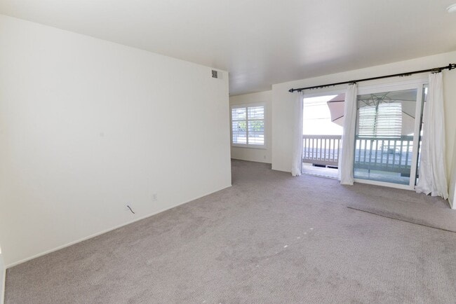 Photo - Sunny 2BR/2BA Coastal Retreat — Steps from the Sand with Ocean Breezes Unit #B