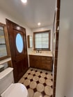 Bath with tub and door to back patio - 9406 Ventura Way
