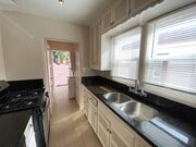 Photo - Cozy North Park Cottage with Enclosed Patio Exclusive Assigned Garage! Air Conditioning! In Unit ... Unit 4077 Iowa St