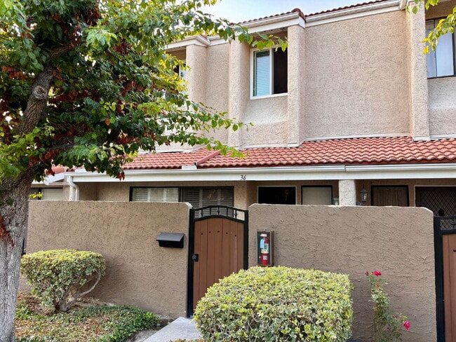 Building Photo - Charming Buena Park Townhouse: Spacious 3-...