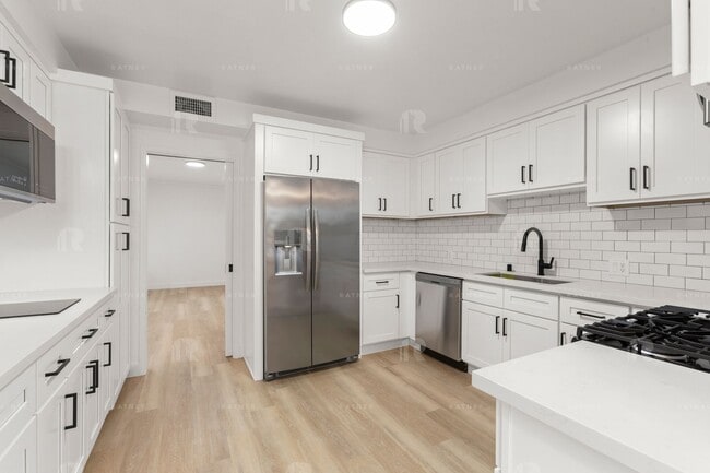 Photo - Newly REMODELED large 4 bed / 4 bath home w/ family room, private bonus room / home office, and "...