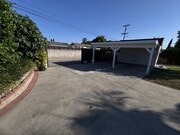 Covered 2 port parking space - 13180 Branford St House