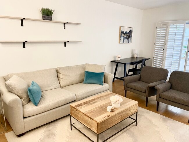 Living Room sofa, desk, chairs - 1131 Alta Loma Rd Unit 123