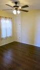 Bedroom with deep shelve cabinets in corner. - 3607 Crest Dr Unit Lower