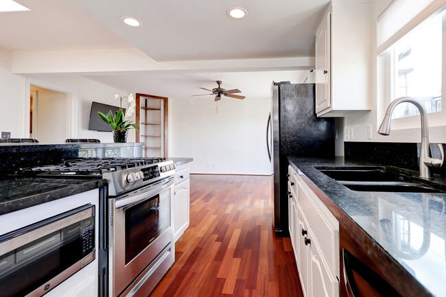 Hardwood floors throughout the great room and kitchen. - 744 12th St Unit 744 12th St