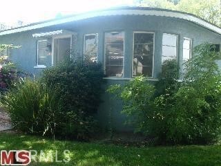 Building Photo - 10913 Moorpark St Unit 1