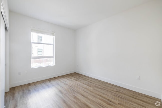 3BR, 2BA - 1,295SF - Bedroom - Lumia Apartments