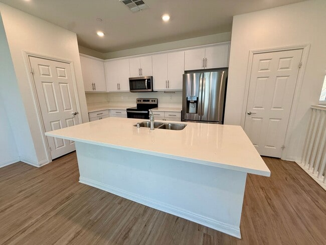 Building Photo - Luxury Townhome 3 level 2 car garage modern kitchen must see charmer $3350