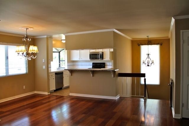 Building Photo - COMING SOON - 3 bed, 2 bath Townhouse with attached 2 car garage ready to move in!! Unit 267