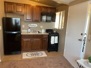 studio kitchen - Palm Villas Apartments