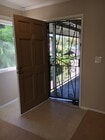 Entry door with security screen - 18630 Del Rio Pl Apartments Unit D
