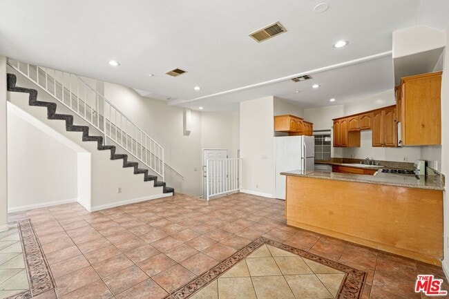 Building Photo - 1201 Viola Ave Unit 104