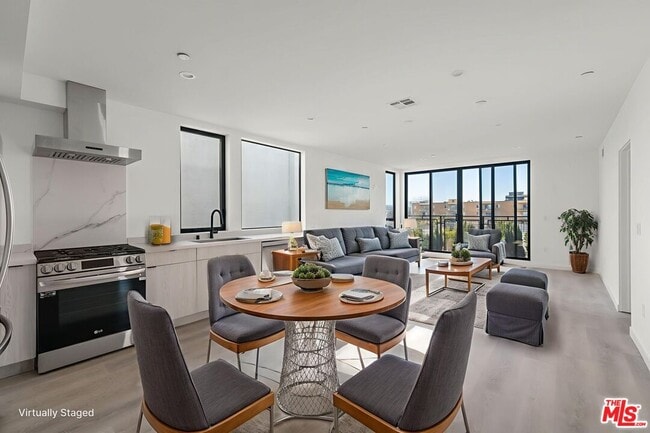 Building Photo - 3755 S Canfield Ave Unit 302