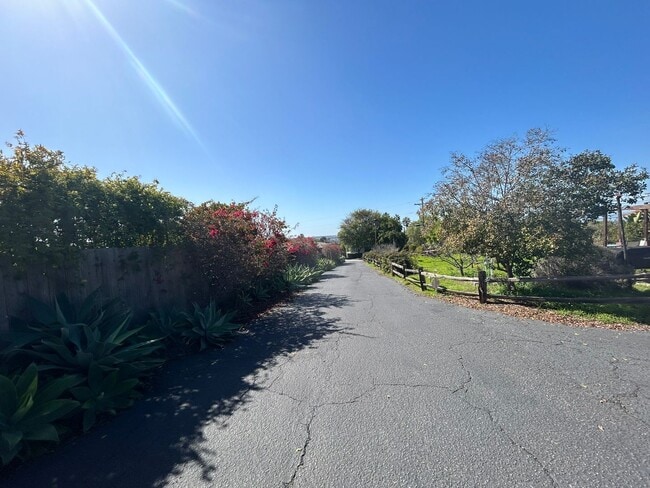 Photo - Cozy 2-Bedroom Duplex with Fireplace & Sunroom in Vista – Don’t Miss Out!