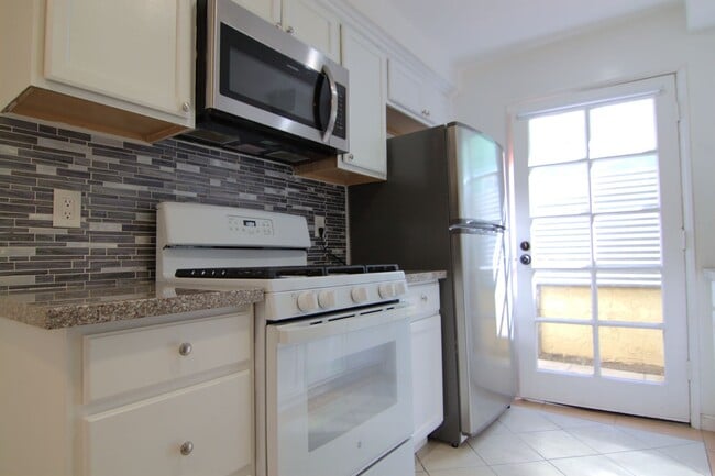 Photo - Charming 1-Bedroom Condo with Fireplace & Private Balcony – Gated Community