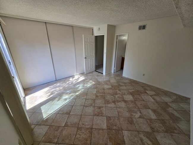 Photo - Spacious 4 Bedroom Home with 2-Car Garage & Large Living Areas
