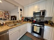 Photo - Modern Bungalow with W/D + A/C! Assigned Parking Included & 1 Garage Storage! Unit 4639 Wilson Avenue