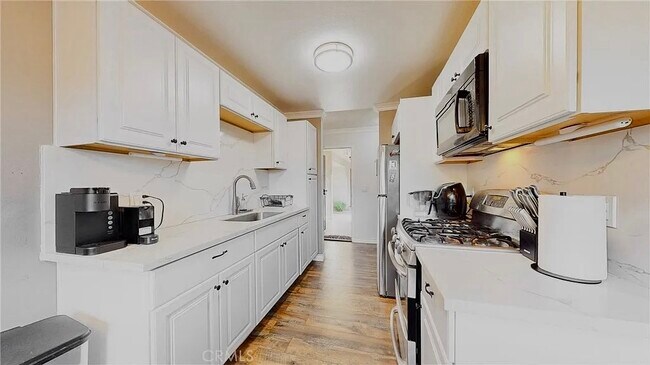 Building Photo - 4591 Orange Ave Unit 103