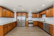 Double refrigerator and stainless steel applicance - 12938 Jefferson Ave House