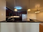 Photo - Upgraded Condo with Private Patio, AC, Pool, Gym, and Covered Parking in Gated Community