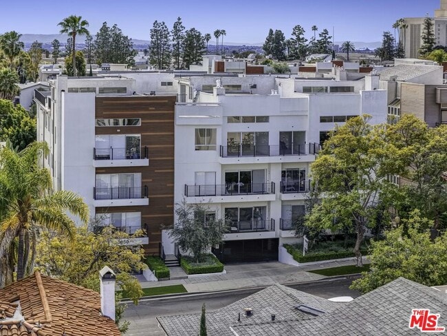 Building Photo - 10630 Wilkins Ave Unit 102