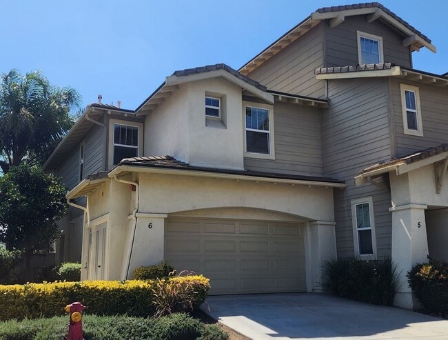 Building Photo - Two Story 3 Bedroom Townhome with 2 Car Garage in Gated Community