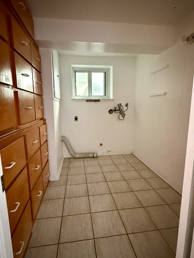 Laundry room with lots of storage - 3500 W Manchester Blvd