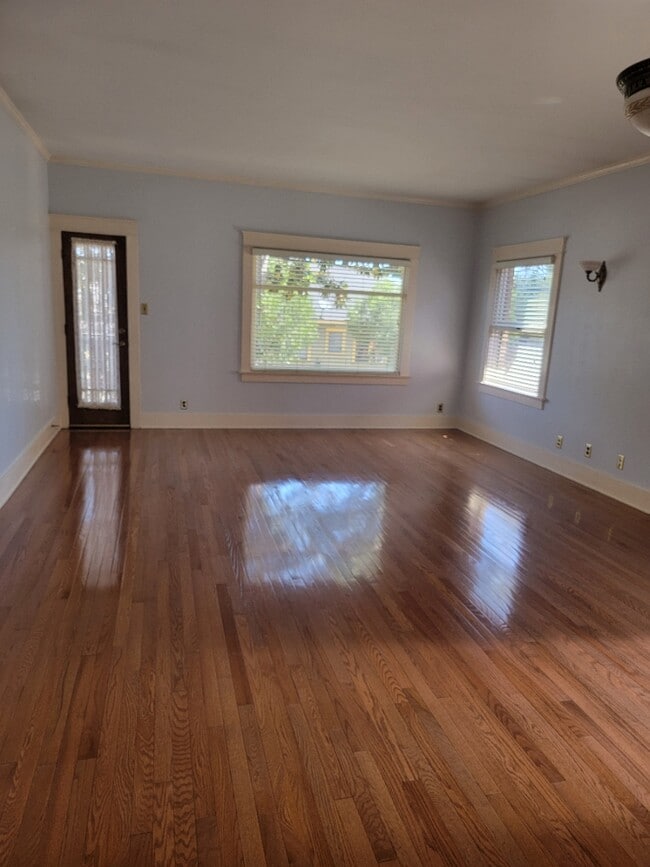 Livingroom and front balcony door - 642 W 8th St Unit 642 W. 8th St.