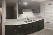 Spacious kitchen with granite counter tops - 3106 Summertime Ln Condo Unit 106