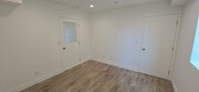 Downstairs bedroom - 10925 Hesby St Apartments Unit 10925