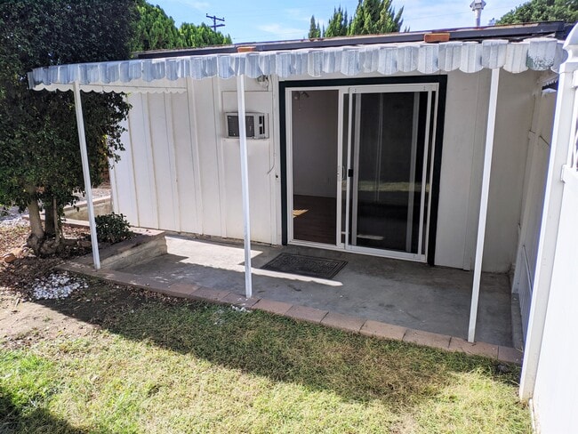 Building Photo - 9211 Fermi Ave Unit 2