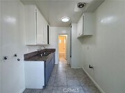 Photo - 595 E 6th St Apartment