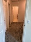 hallway to kitchennet and laundry room - 7893 Boot Straps Ct House